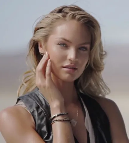 Photo: Nomadic, CC BY-SA 3.0, via Wikimedia Commons Candice Swanepoel, typed as Light Spring