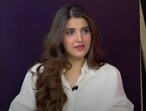 Photo: VOA Urdu, Public domain, via Wikimedia Commons Hareem Farooq, typed as Bright Winter