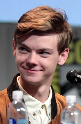 Photo: Gage Skidmore, CC BY-SA 3.0, via Wikimedia Commons Thomas Brodie-Sangster, typed as True Autumn